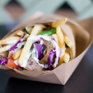 Beef/lamb Gyro. With Fries inside.
