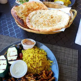 Chicken Shawarma Plate with rice and veggies and a Gyro Plate with rice and a side salad. Comes with Naan bread. So good!!