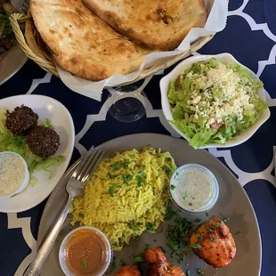 Chicken kabob plate with Naan bread and side of falafels