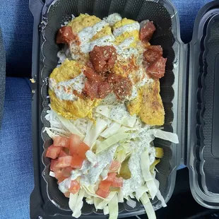 $15+ dollars for subpar food and tiny portion. This is their plate.