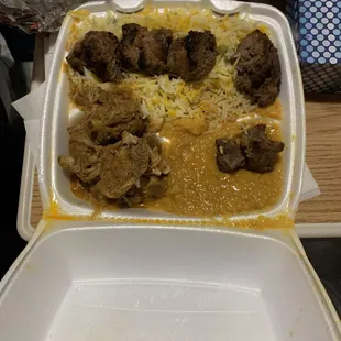 Lamb kabob meal with rice, lentil and chicken curry with naan on the side(which is not on the picture)