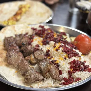 Ribeye beef kabobs and lamb kabobs over cranberry rice. Simply amazing.