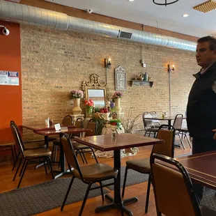 a man standing in a restaurant