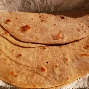 Chapathi ($4), vegan by default. Fine, but the tandoori roti is better.