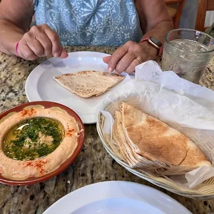 a woman sitting at a table