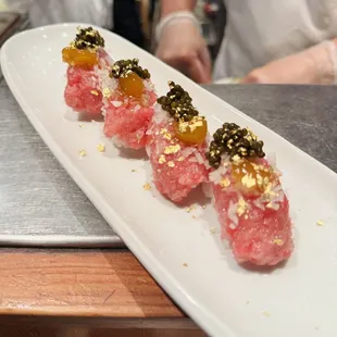 Ohagi (special mince toro with black caviar, marinated egg-yolk and gold flakes)