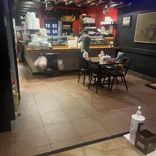 a view of a kitchen and dining area