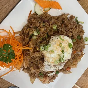 a plate of rice and vegetables