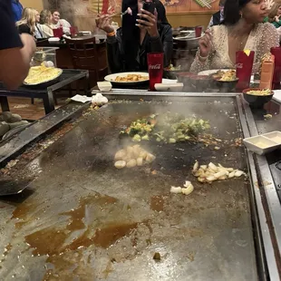 a woman taking a picture of her food
