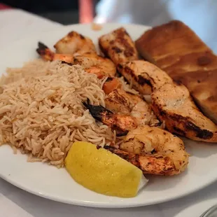 a plate of chicken and rice