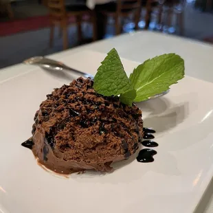 a chocolate dessert on a white plate