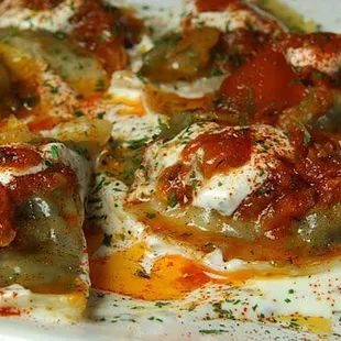 Aushak (scalliion &amp; leek filled dumplings, topped with yogurt mint and tomato meat sauce)