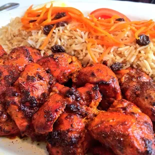 Murgh (Chicken Kabob) Two skewers of juicy charbroiled boneless pieces of succulent  marinated chicken