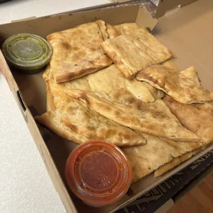 Bolani kachaloo traditional bread stuffed with a potato filler. Excellent.  And the sauces they provide!