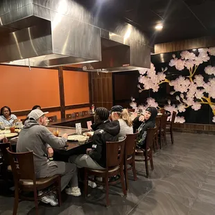 a group of people sitting at a table