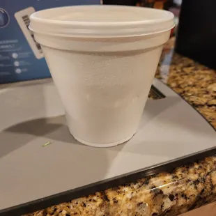 a cup on a tray