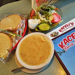 a bowl of soup and a sandwich