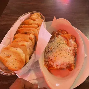 a plate of pizza and bread