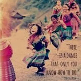 a group of children dancing