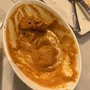 Butter chicken (half eaten)