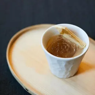 a cup of coffee on a tray