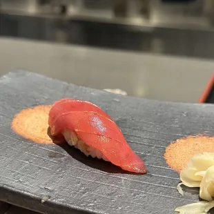 a sushi on a plate