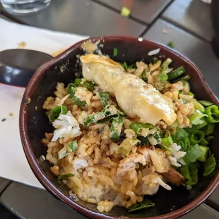 a bowl of rice and vegetables