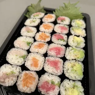 Negi Hama, salmon, negi toro, and avocado rolls