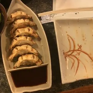 Two sexy jalapeño rolls, fried pop-stickers and spicy edamame