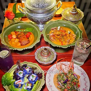 Royal flower dumplings, duck curry sauce, crab coconut curry, royal Thai spicy herbal shrimp salad.