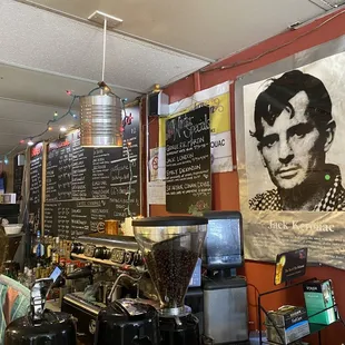a man behind a coffee machine