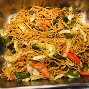 a bowl of noodles with vegetables
