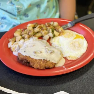 Chicken fried steak and eggs