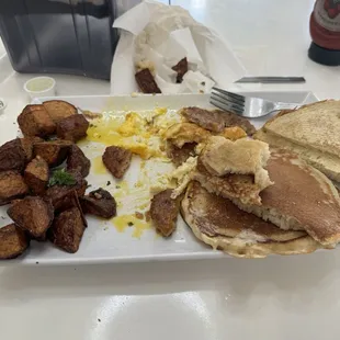 All American eggs over easy. Only 1/2 the eggs were not over fried.. pancakes cold.