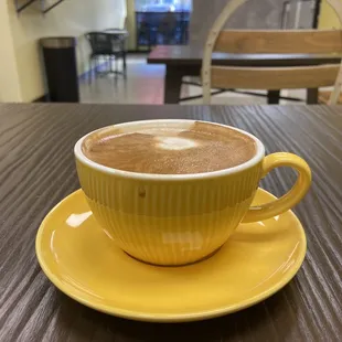 a cup of coffee on a saucer