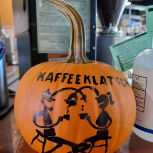 Their cute logo on a pumpkin