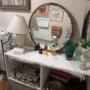 All the vintage antiques inside the coffee shop&apos;s bathroom