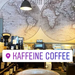 a person holding a cup of coffee