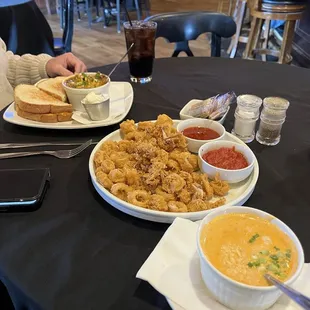 Brisket grilled cheese, cup of ribeye chili, fried calamari and cup of lobster bisque