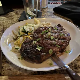 Ribeye with mashed potatoes and steamed veggies.