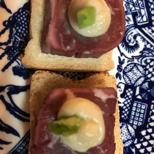 Beef with Gorgonzola garlic mousse on mini toasts