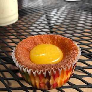Butter mochi cupcake with lilikoi butter