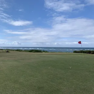 Green facing the ocean.
