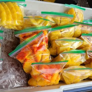 Chue's stand. Pre-cut fruit. Love Hawaiian papaya!