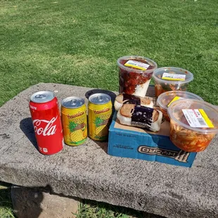 Poke bowl, cabbage kimchi, cucumber kimchi, taegu, and 2 spam musubi.