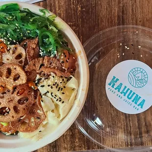 Make your own large bowl with yellow tuna, salmon, and spicy tuna. Lotus root chips on top are awesome!