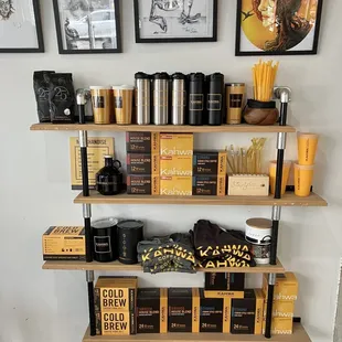 a shelf of coffee roasting supplies