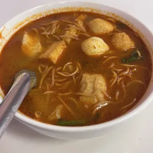 Tom Yum without the shrimp. Has fish balls and tilapia.