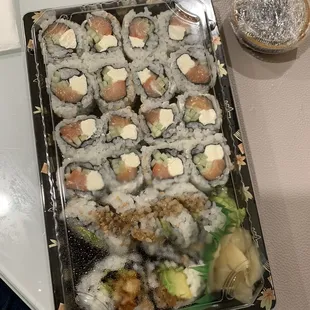 a tray of sushi rolls