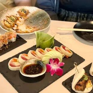 Garlic roll, Lollipop roll, pork belly bao bun, triple YUM!